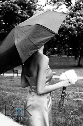 Bridesmaid Holding Umbrella