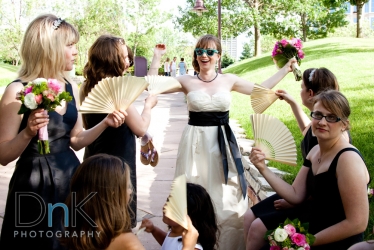 Bridesmaids Fanning Bride