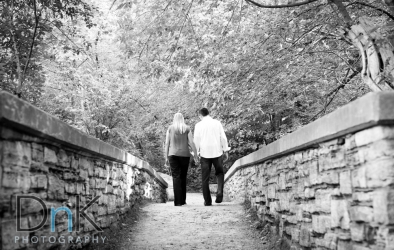 Engagement Pictures Walking on Bridge