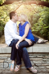 Engagement Pictures sitting on bridge Minneapolis Wedding Photographer