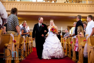 bride walking down the isle st stan's winona
